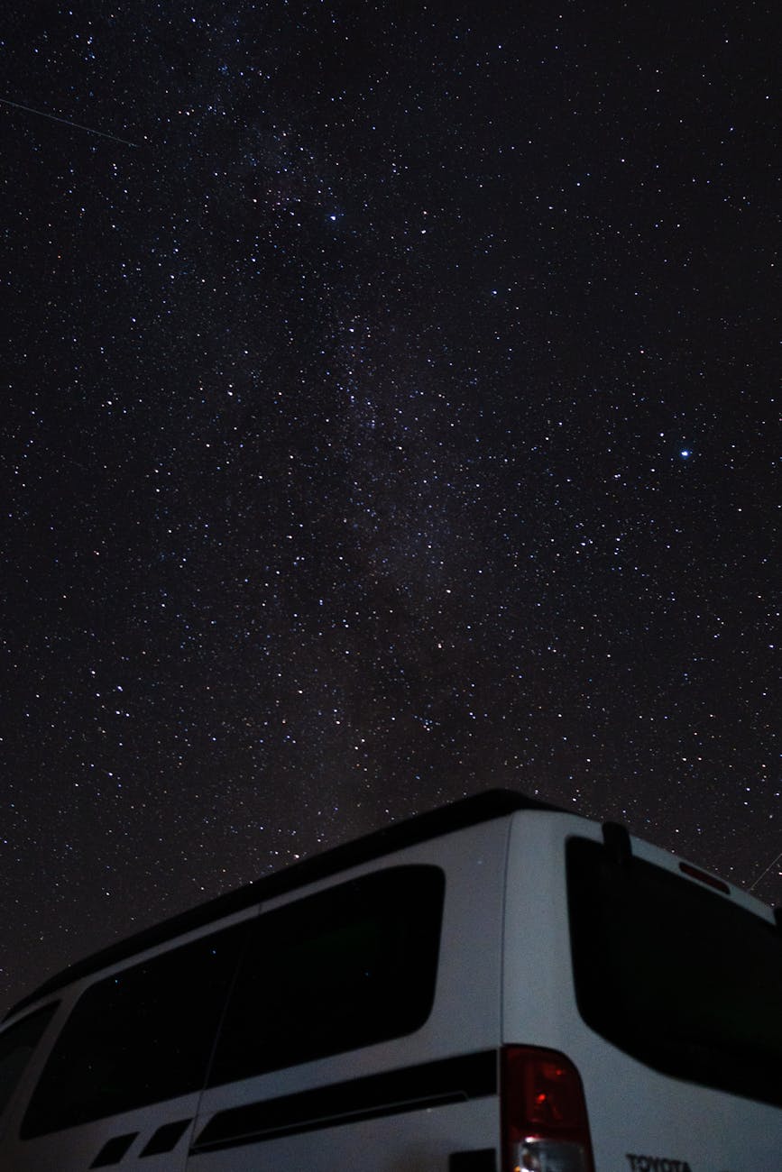 starry sky over a van
